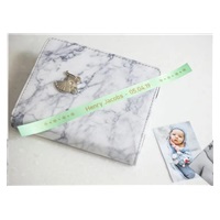 BROTHER TZE-RM34 - 12 mm široká kazeta s TZ páskou, 4 m TEXTILNÁ páska - na výrobu darčekov - MATNÁ PÁSKA, ZLATÝ POTISK