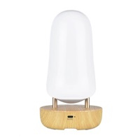 Rabbit & Friends Lampička ptáček s reproduktorem | Bílá